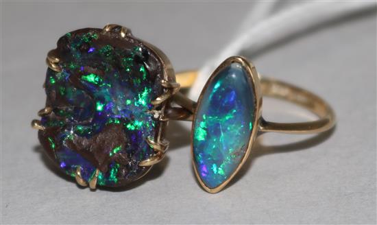 Two 9ct gold and black opal rings.